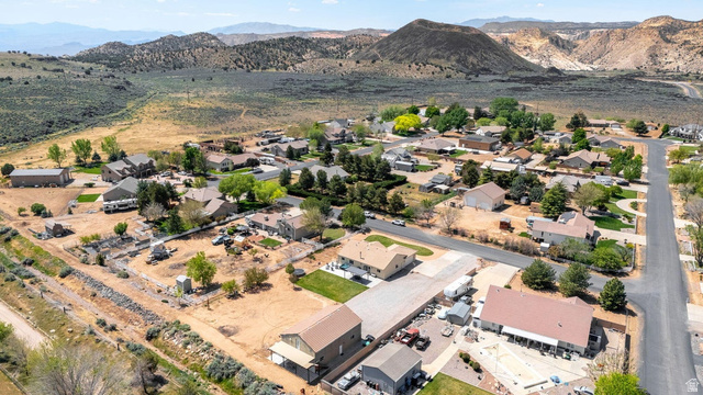 7776 Wagon Road East St. George, UT 84770 - Photo 74 of 76 Aerial view of property's location with mountains and nearby suburban area