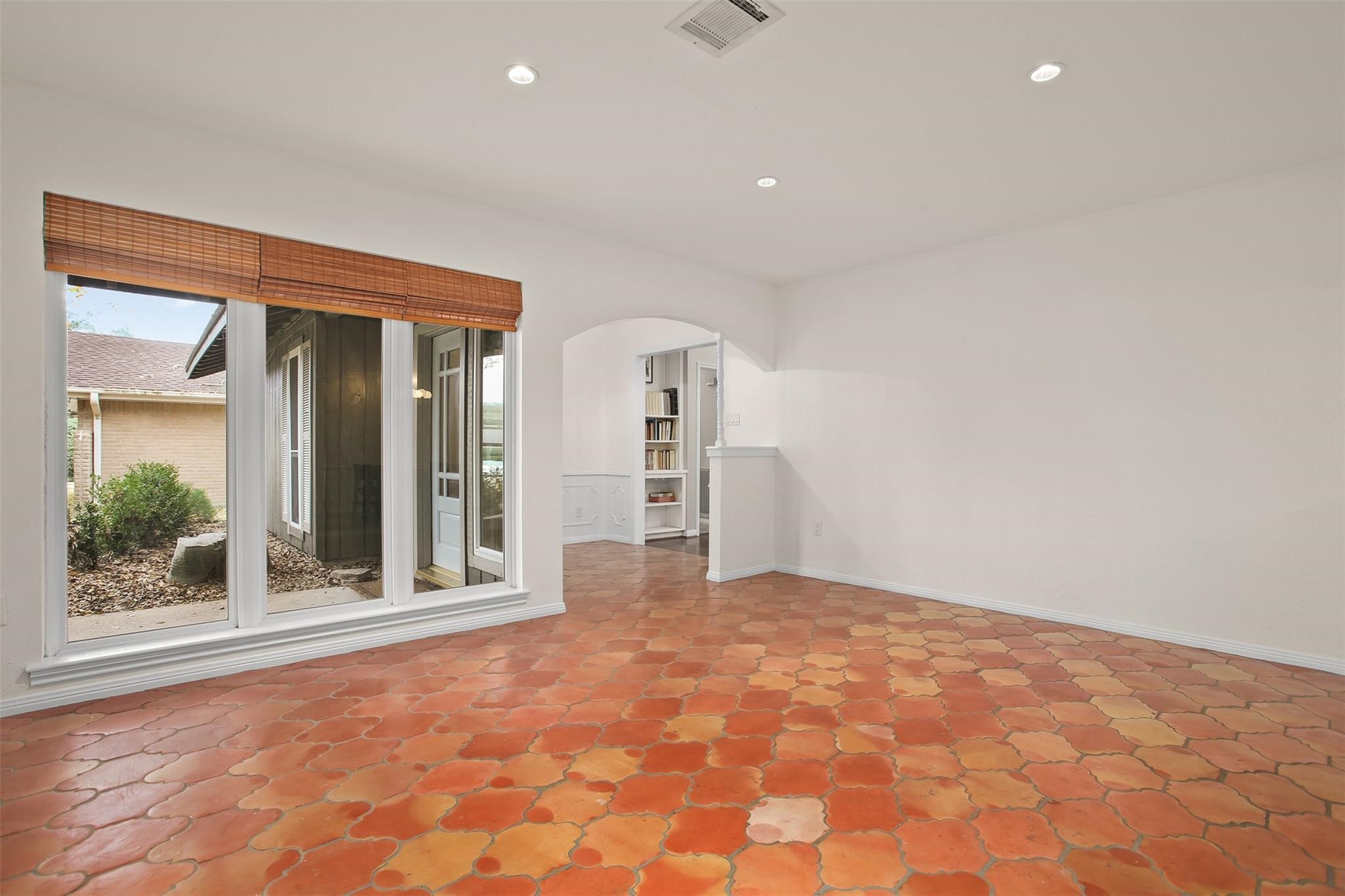 18306 Barbuda Lane Houston, TX 77058 - Photo 12 of 25 a view of an empty room with a window