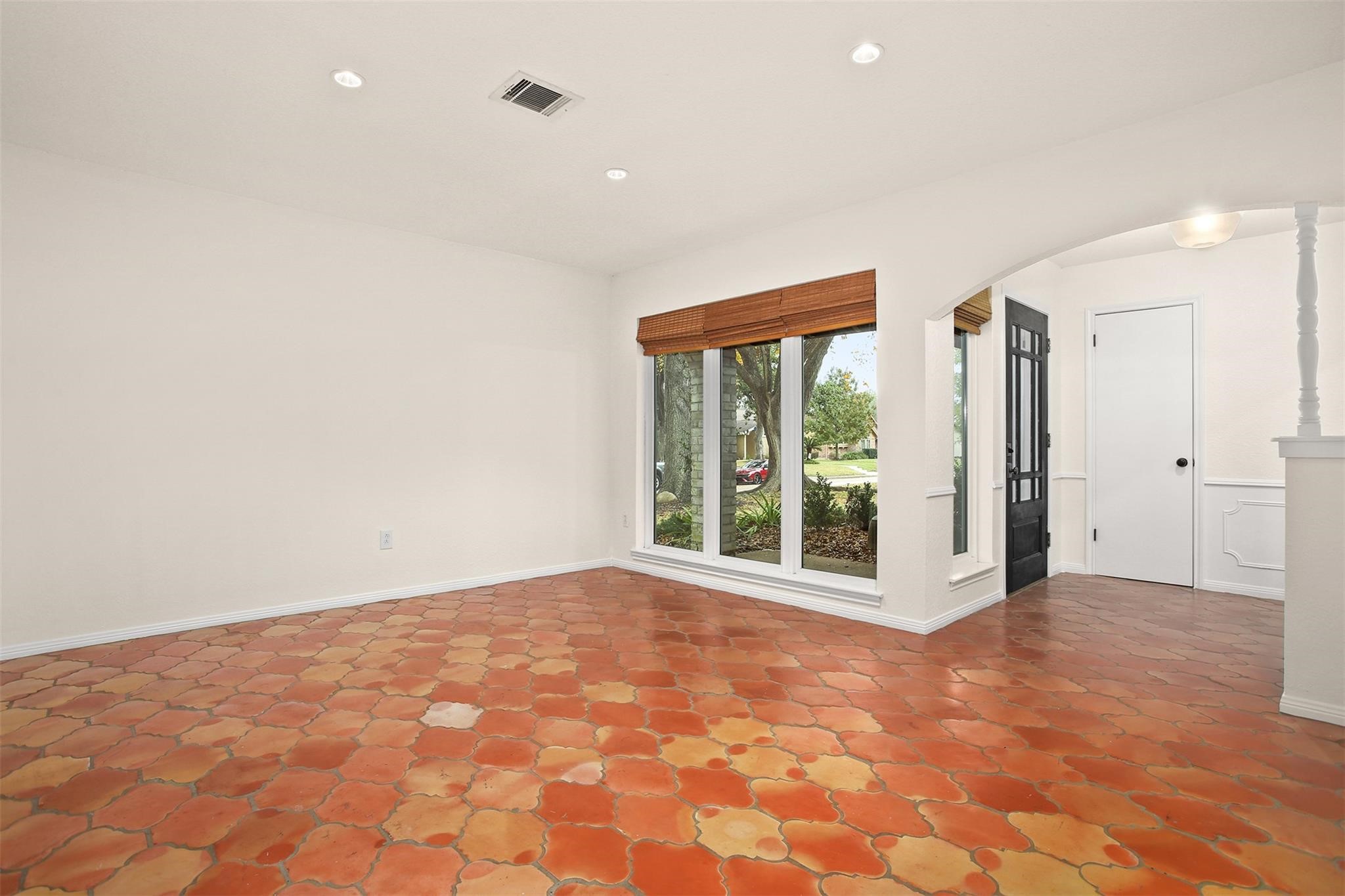 18306 Barbuda Lane Houston, TX 77058 - Photo 13 of 25 a view of an empty room with a window