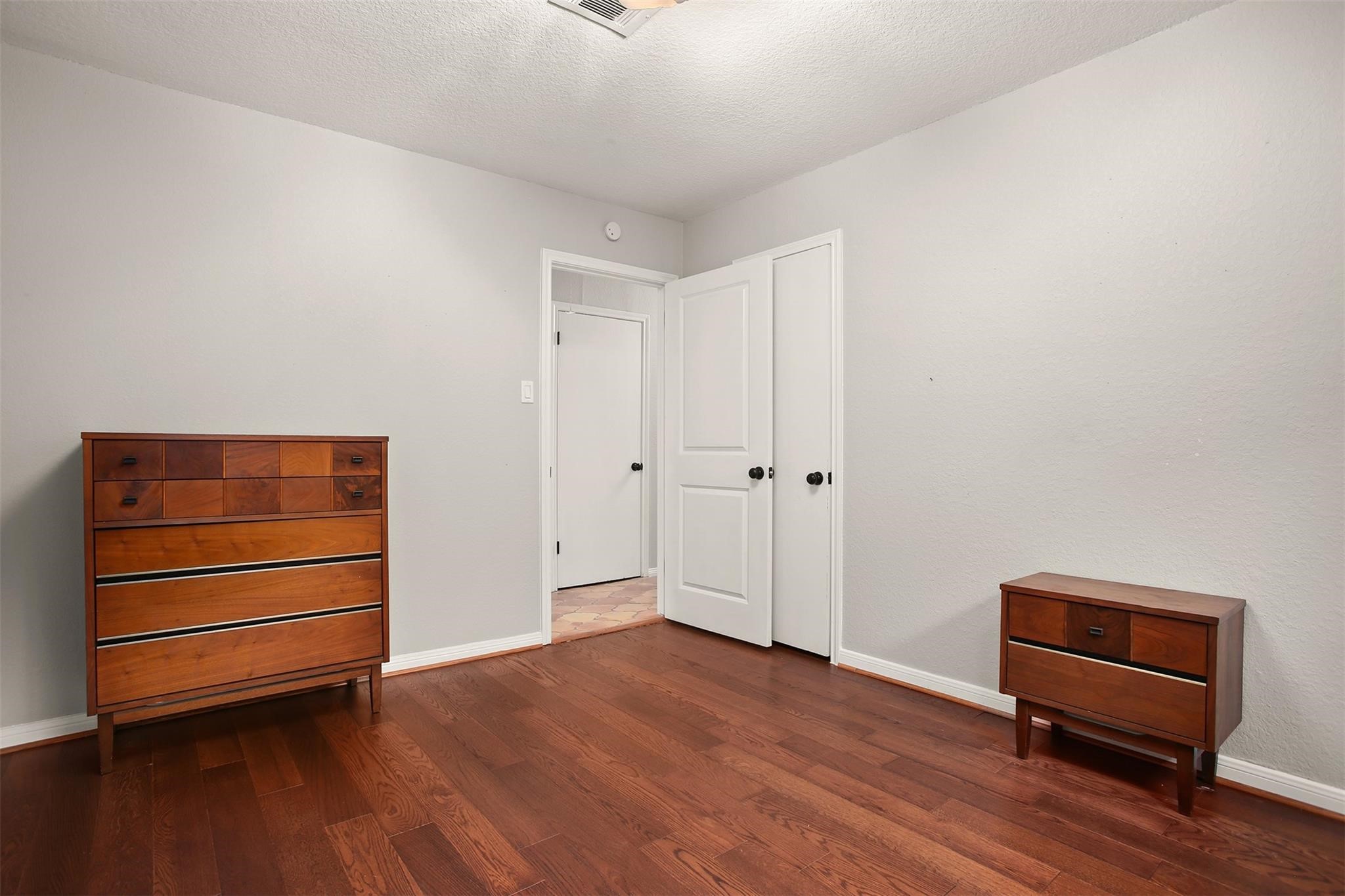 18306 Barbuda Lane Houston, TX 77058 - Photo 16 of 25 a view of room with hardwood wall
