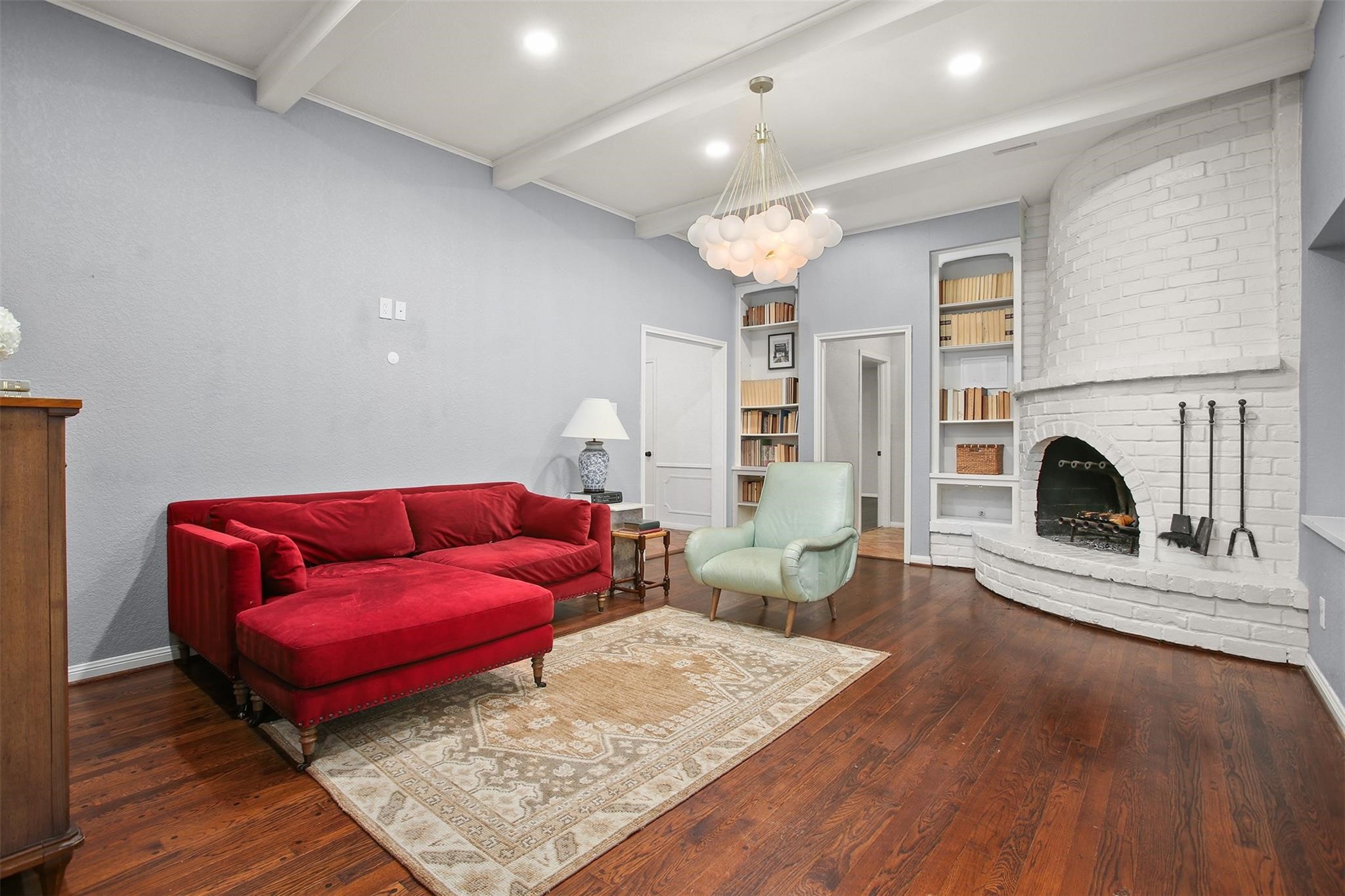 18306 Barbuda Lane Houston, TX 77058 - Photo 9 of 25 a living room with furniture and a fireplace