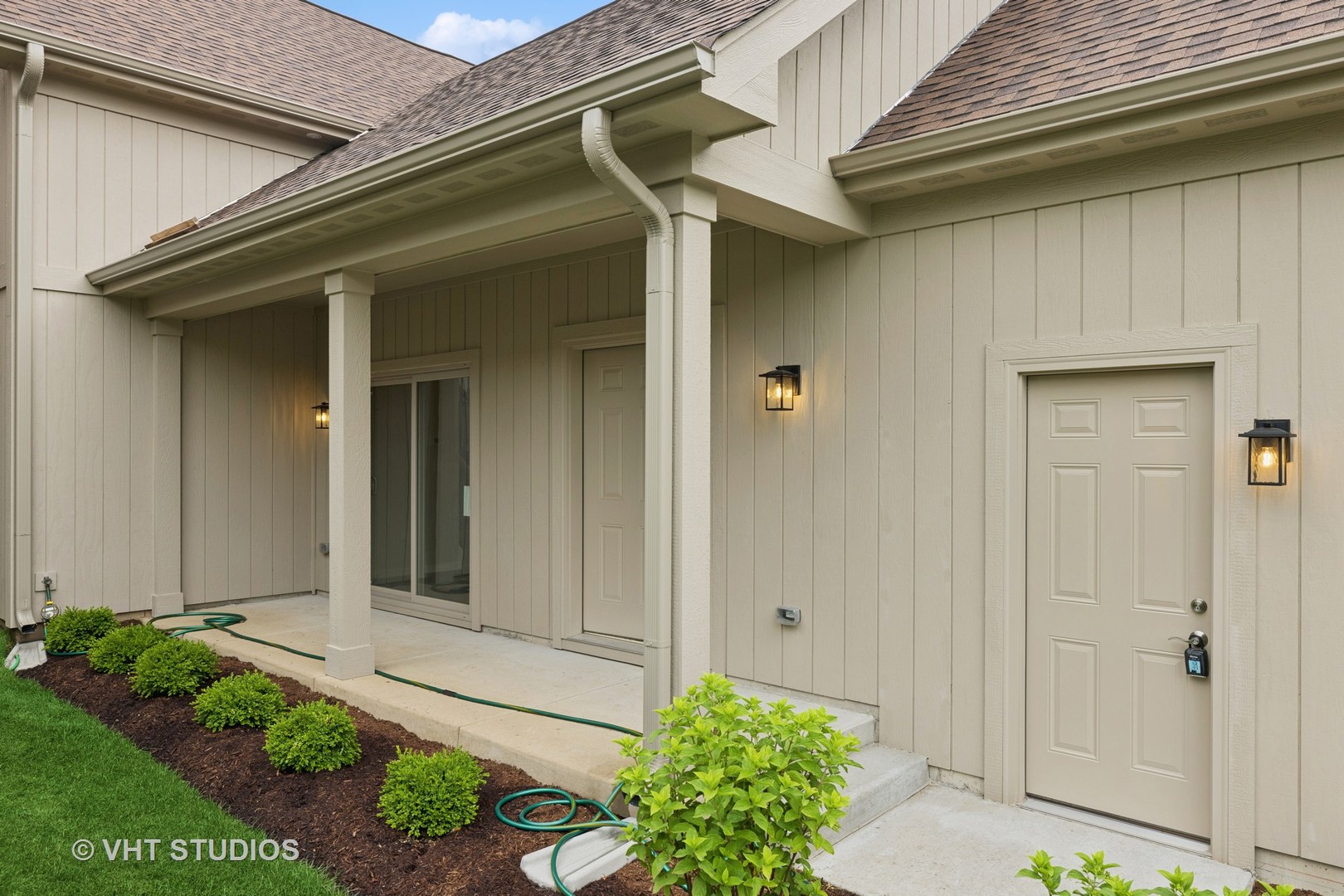 5912 Prairie Ridge Road Crystal Lake, IL 60014 - Photo 16 of 23 a front view of a house with a yard