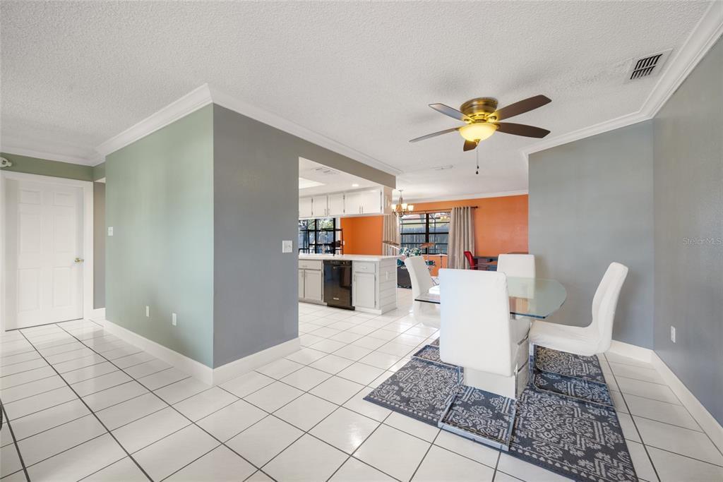 8714 Martinique Lane Port Richey, FL 34668 - Photo 12 of 34 a living room with a couch