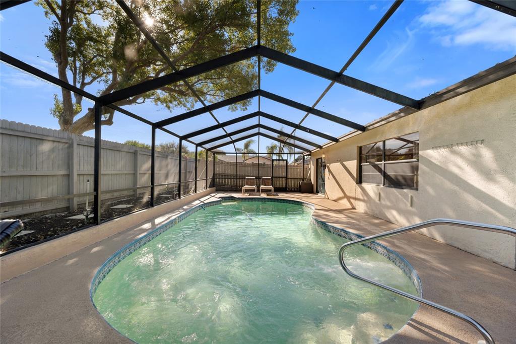 8714 Martinique Lane Port Richey, FL 34668 - Photo 29 of 34 a view of a backyard