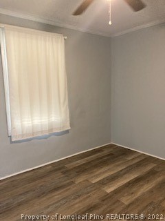5146 Matt Hair Road Fayetteville, NC 28312 - Photo 14 of 23 an empty room with wooden floor and windows