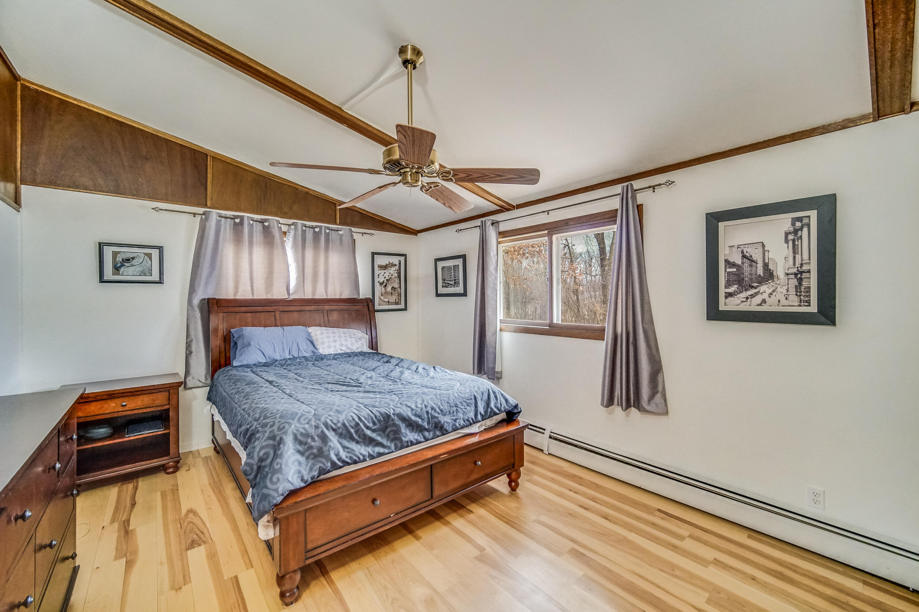 5203 Vasa Terrace Lowell, IN 46356 - Photo 11 of 33 a bedroom with a bed and wooden floor