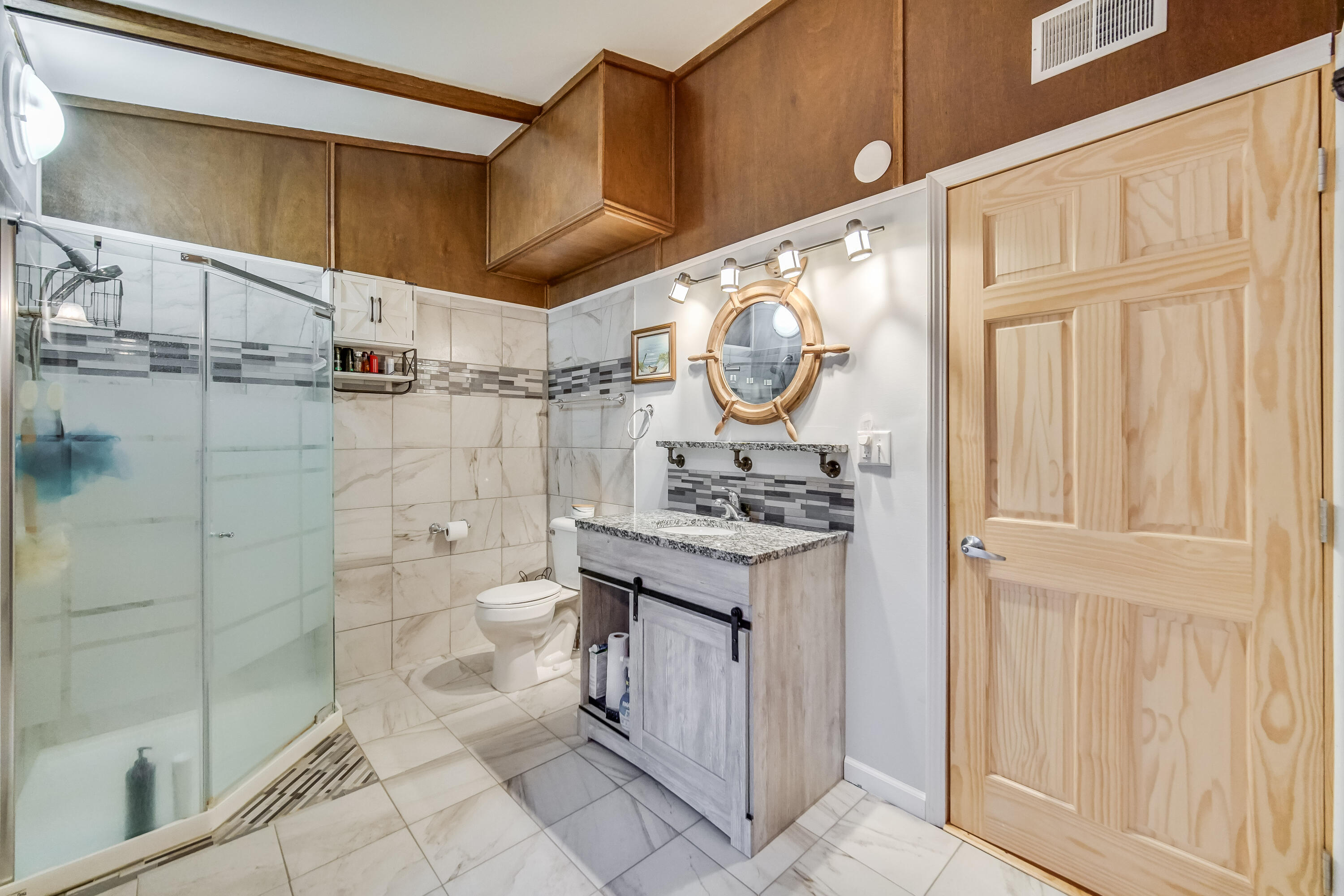 5203 Vasa Terrace Lowell, IN 46356 - Photo 12 of 33 a bathroom with a sink a toilet and shower