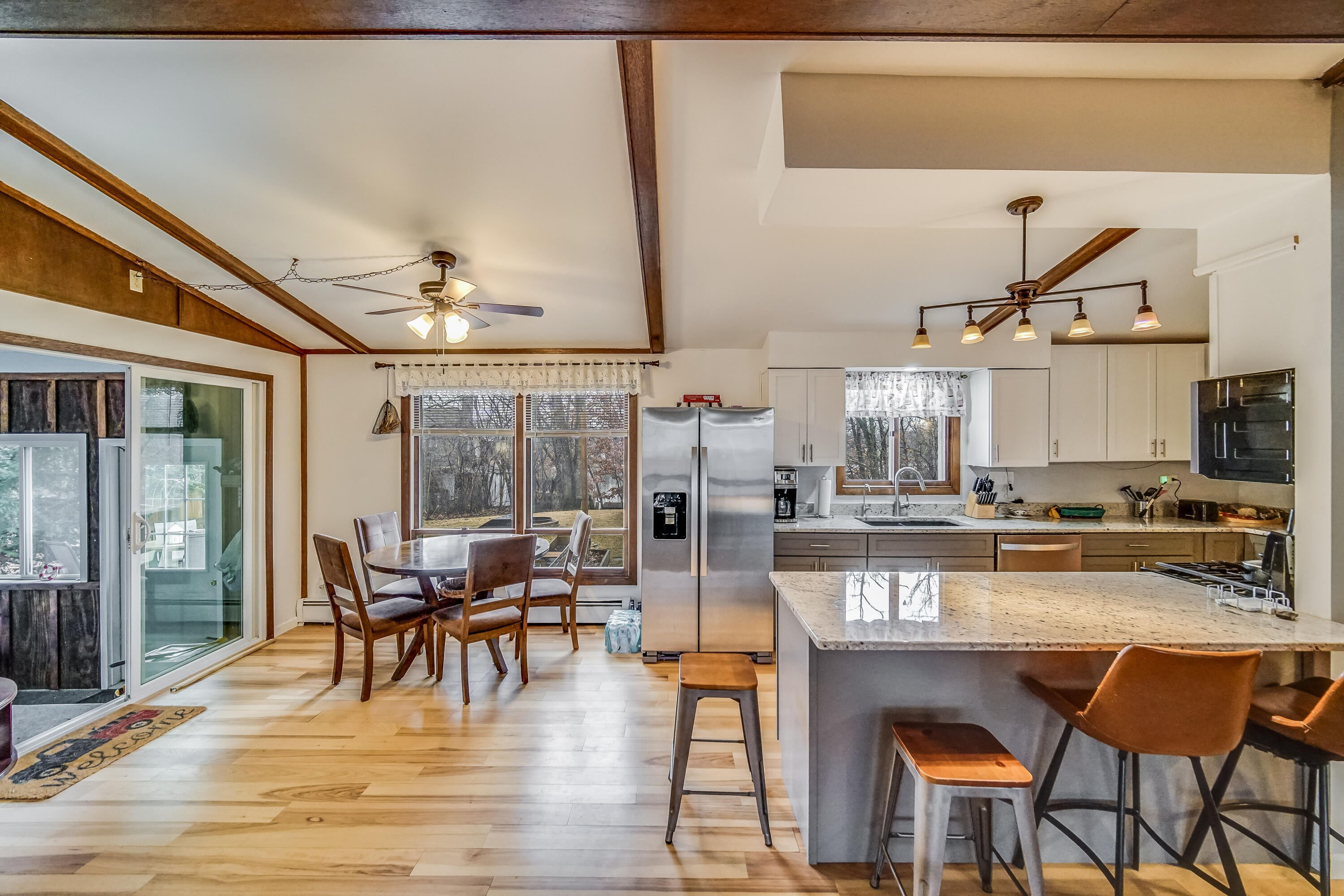 5203 Vasa Terrace Lowell, IN 46356 - Photo 17 of 33 a dining room with furniture and wooden floor