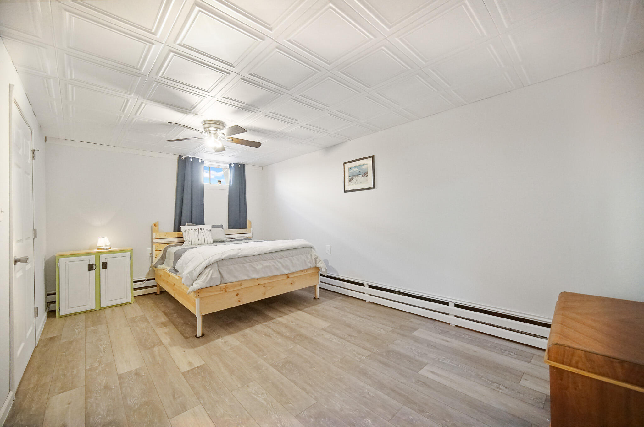 5203 Vasa Terrace Lowell, IN 46356 - Photo 18 of 33 a bedroom with a bed and cabinets