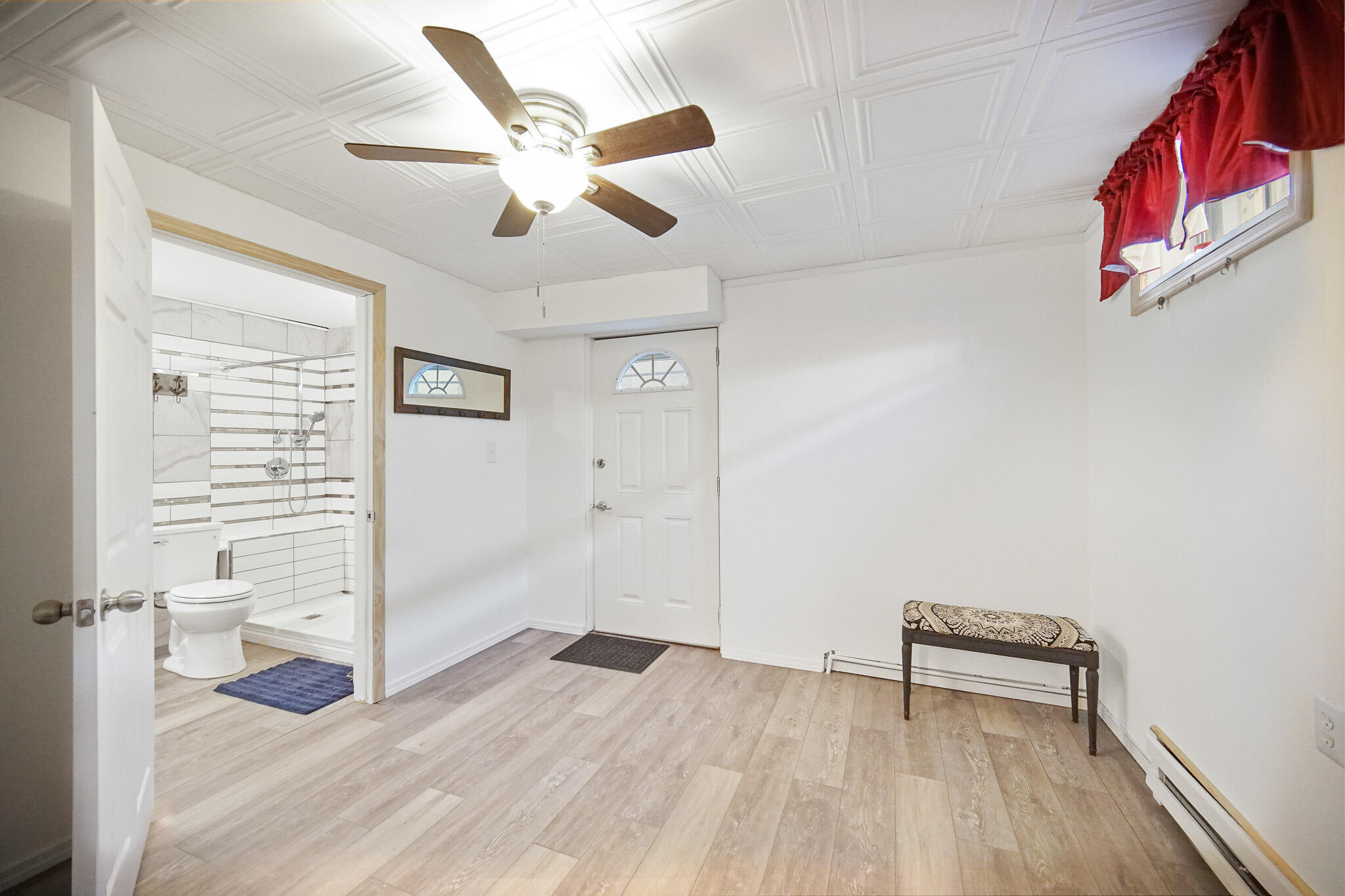 5203 Vasa Terrace Lowell, IN 46356 - Photo 19 of 33 wooden floor in an empty room with a window
