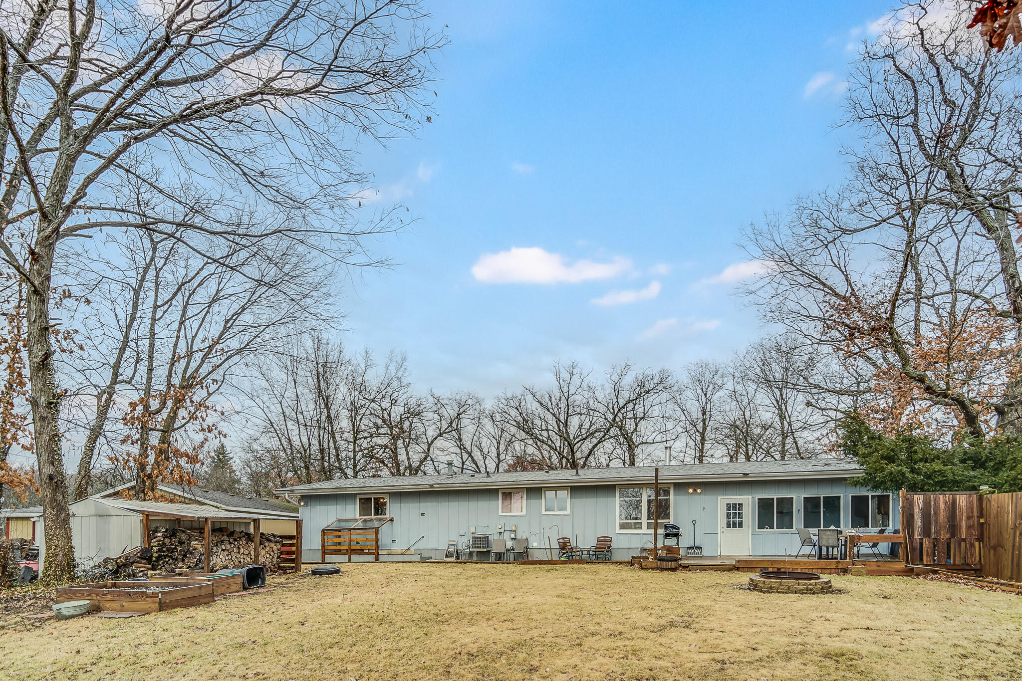 5203 Vasa Terrace Lowell, IN 46356 - Photo 32 of 33 a front view of house with yard and trees in the background