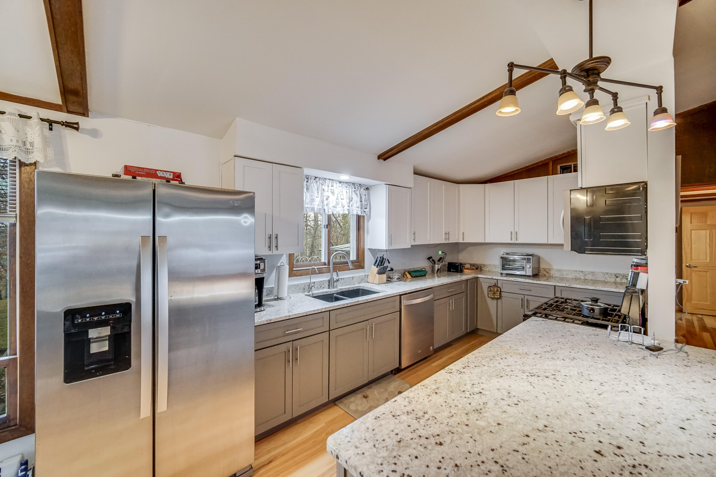 5203 Vasa Terrace Lowell, IN 46356 - Photo 9 of 33 a kitchen with sink cabinets and stainless steel appliances
