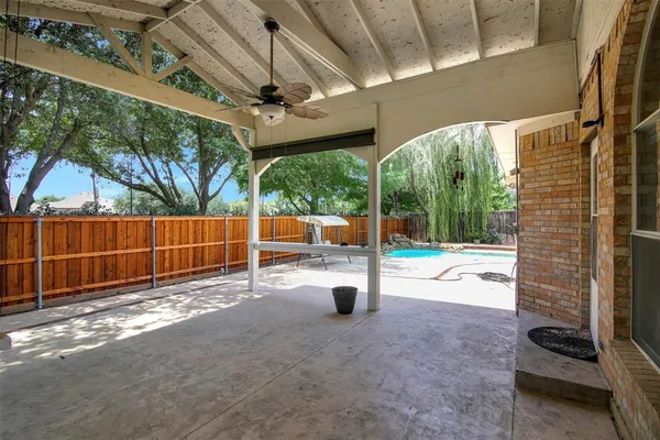 a view of a room with porch and wooden floor
