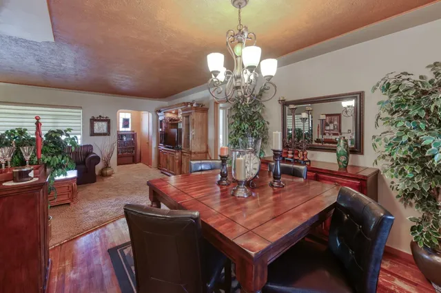 a kitchen with stainless steel appliances a sink stove and refrigerator