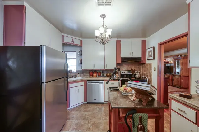 a bed room with a bed and a window