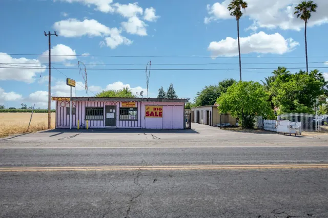 a view of a yard with an ocean view