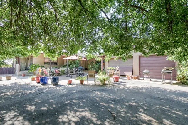 a house view with a garden space