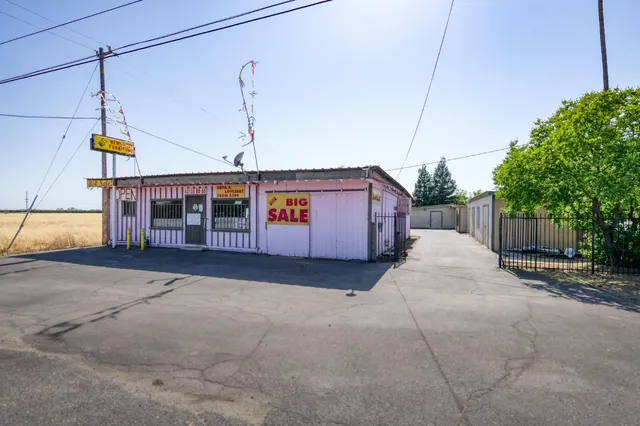 a view of a balcony with wooden floor