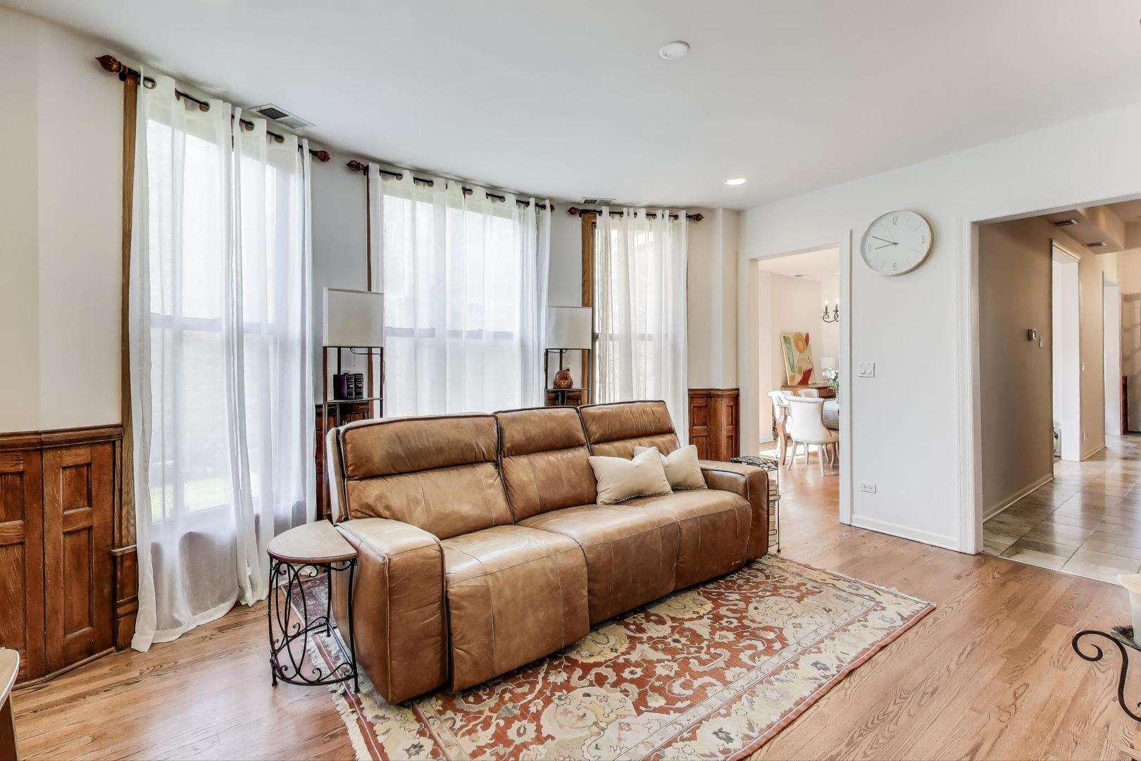 4553 South Ellis Avenue Chicago, IL 60653 - Photo 17 of 62 a living room with furniture and a large window