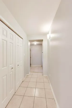 a picture of a bathroom with a sink and mirror