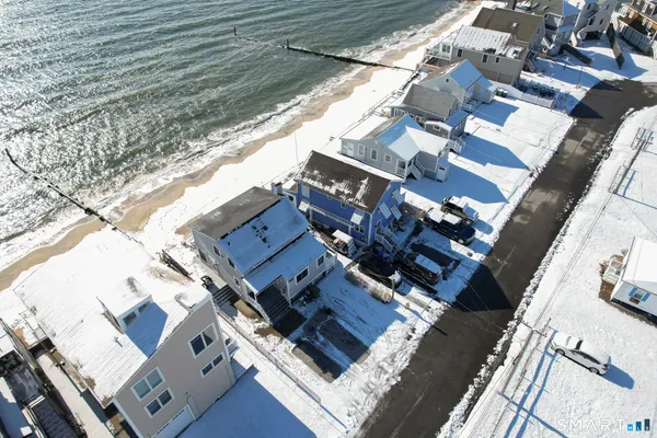 an aerial view of residential building with parking space