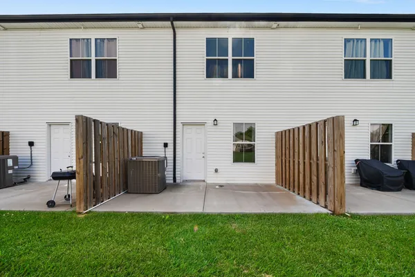 a view of backyard with barbeque grill