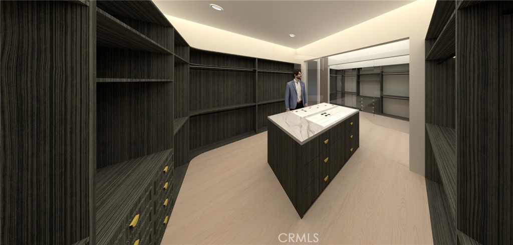 23509 Ridge Line Road Diamond Bar, CA 91765 - Photo 9 of 23 Proposed master bedroom's over-sized luxurious walk-in closet with built in shelving and central marble-top island dresser