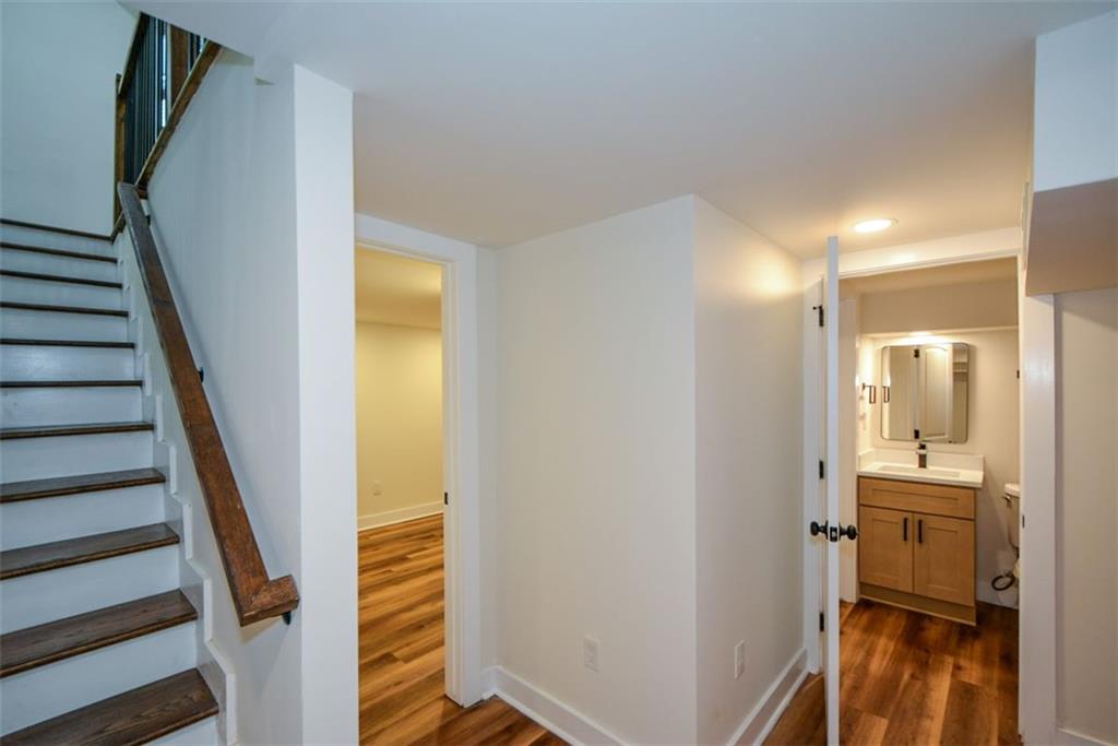 1275 Westridge Road Southwest Atlanta, GA 30311 - Photo 25 of 38 a view of a bathroom from a corridor