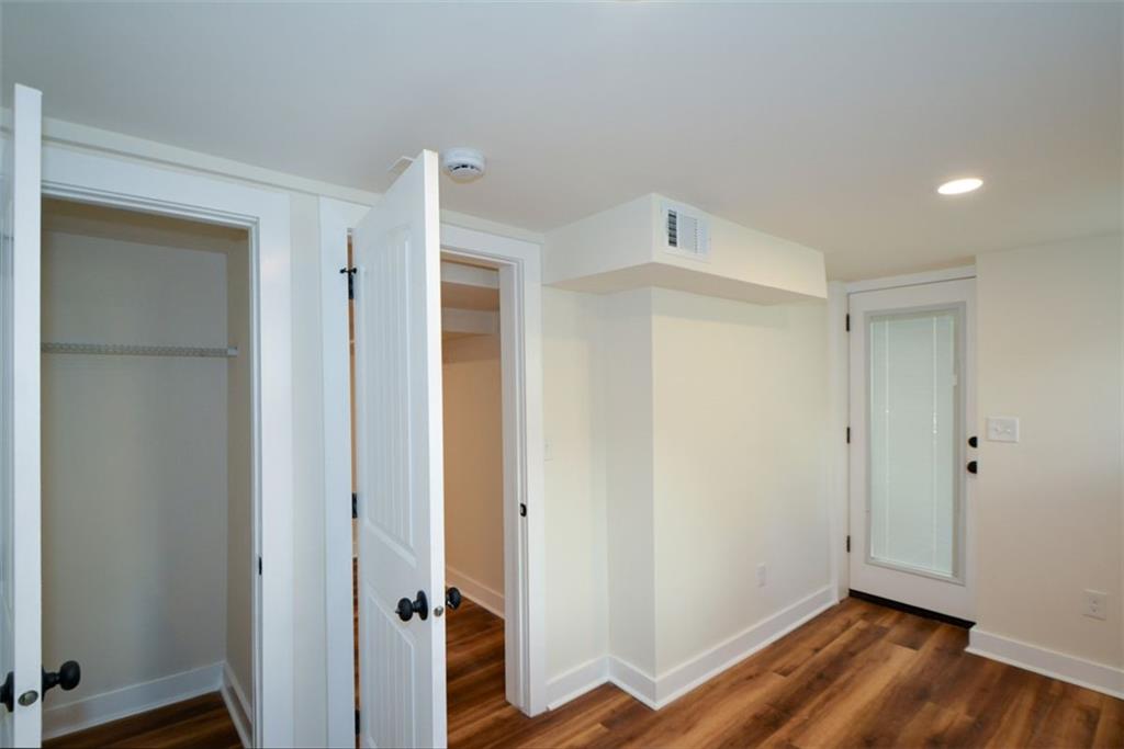 1275 Westridge Road Southwest Atlanta, GA 30311 - Photo 27 of 38 a view of entryway with wooden floor