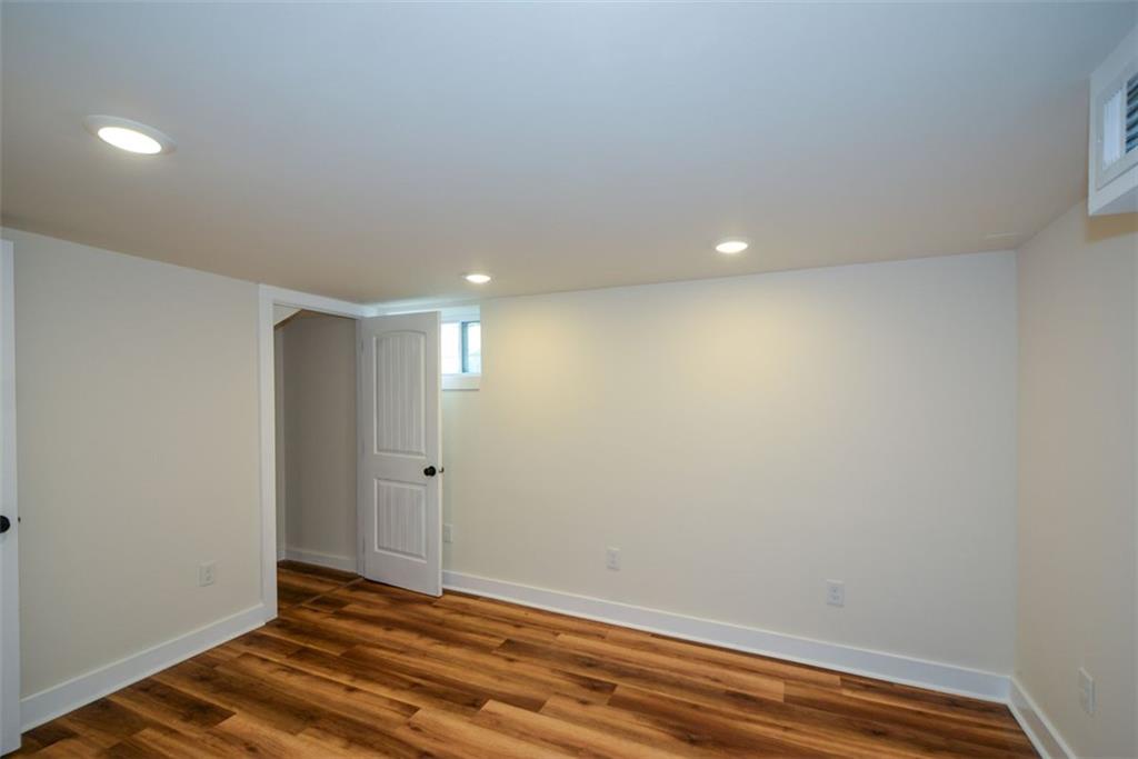 1275 Westridge Road Southwest Atlanta, GA 30311 - Photo 29 of 38 a view of wooden floor
