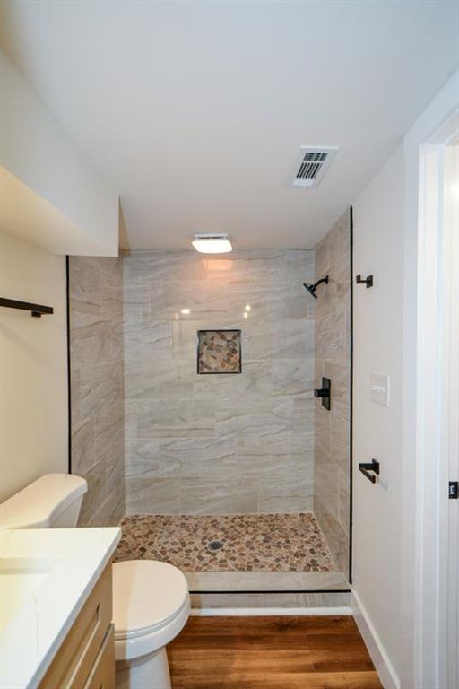 1275 Westridge Road Southwest Atlanta, GA 30311 - Photo 30 of 38 a bathroom with a shower and a toilet