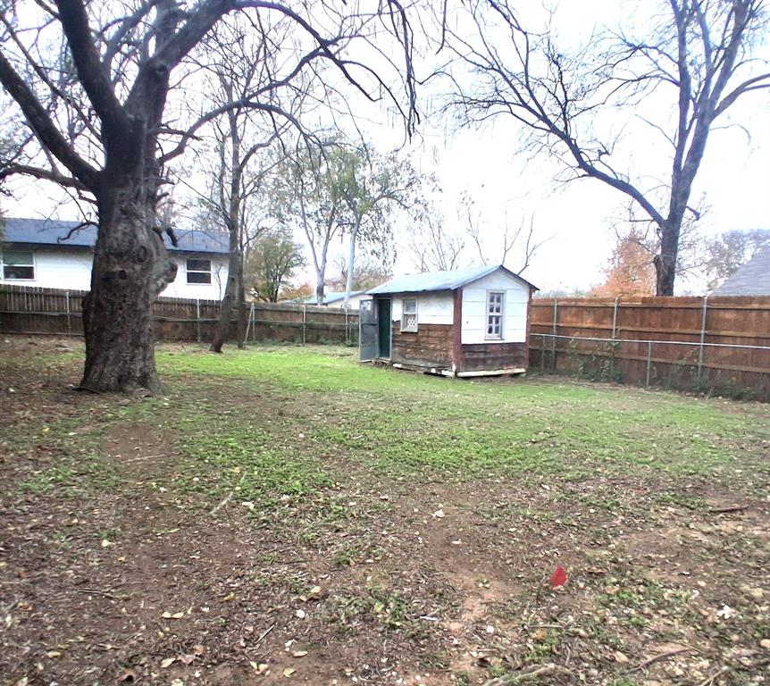 820 Allen Street Denton, TX 76205 - Photo 14 of 14 a house view with a sitting space and garden