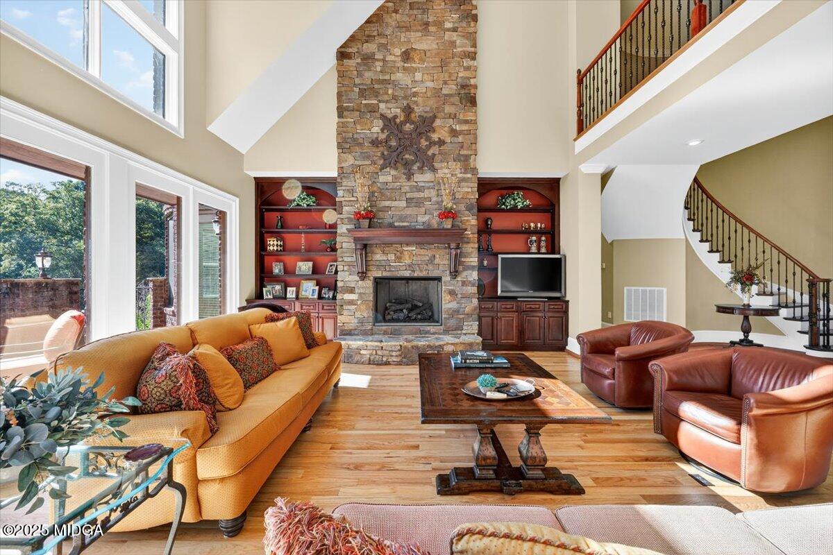 208 Crystal Drive Byron, GA 31008 - Photo 20 of 87 a living room with fireplace furniture and a floor to ceiling window