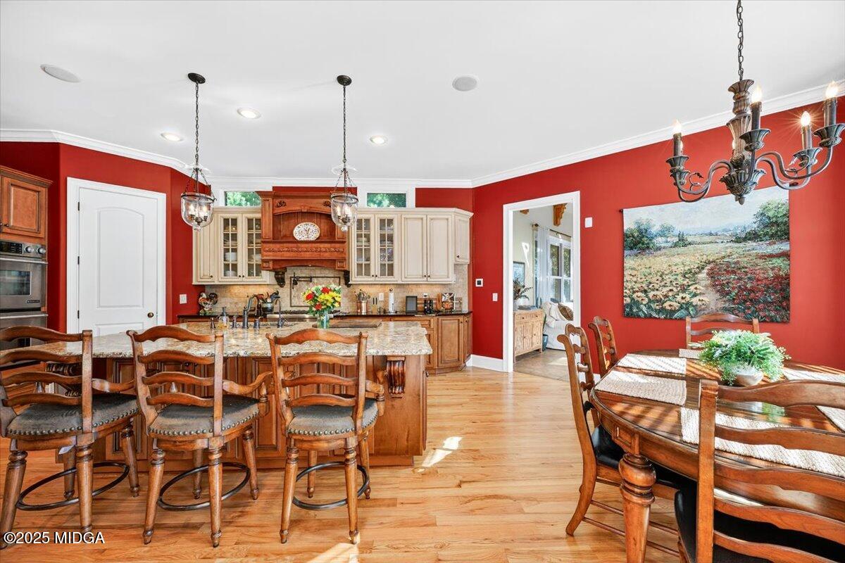208 Crystal Drive Byron, GA 31008 - Photo 28 of 87 a view of a dining room with furniture window and wooden floor