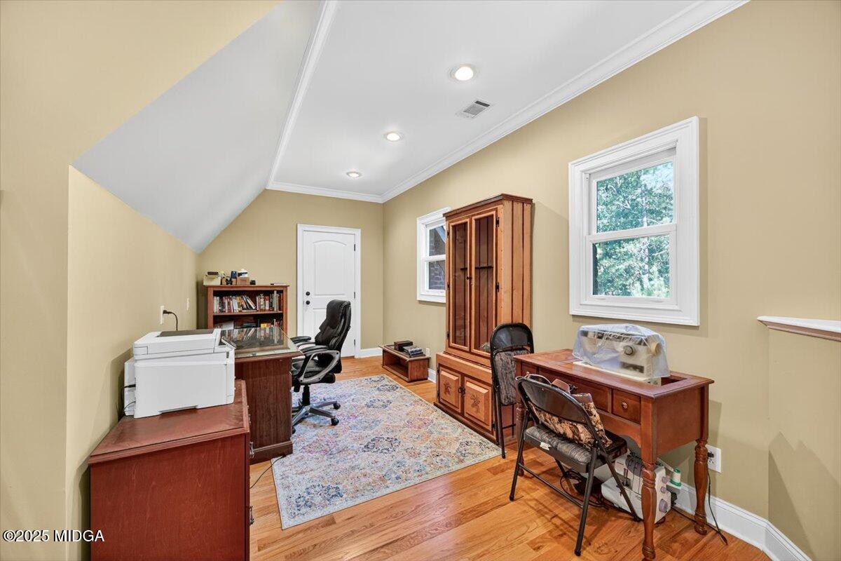 208 Crystal Drive Byron, GA 31008 - Photo 44 of 87 a view of a workspace with furniture and a window