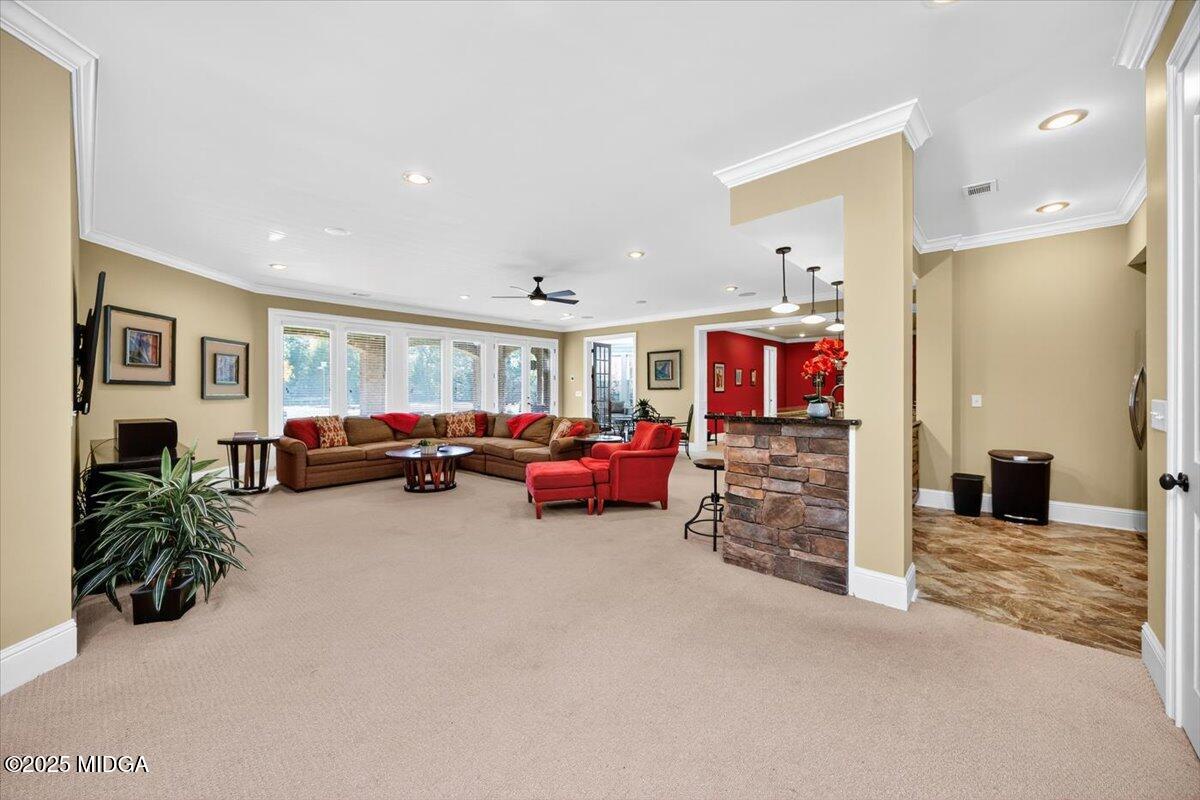 208 Crystal Drive Byron, GA 31008 - Photo 54 of 87 a living room with furniture and a flat screen tv