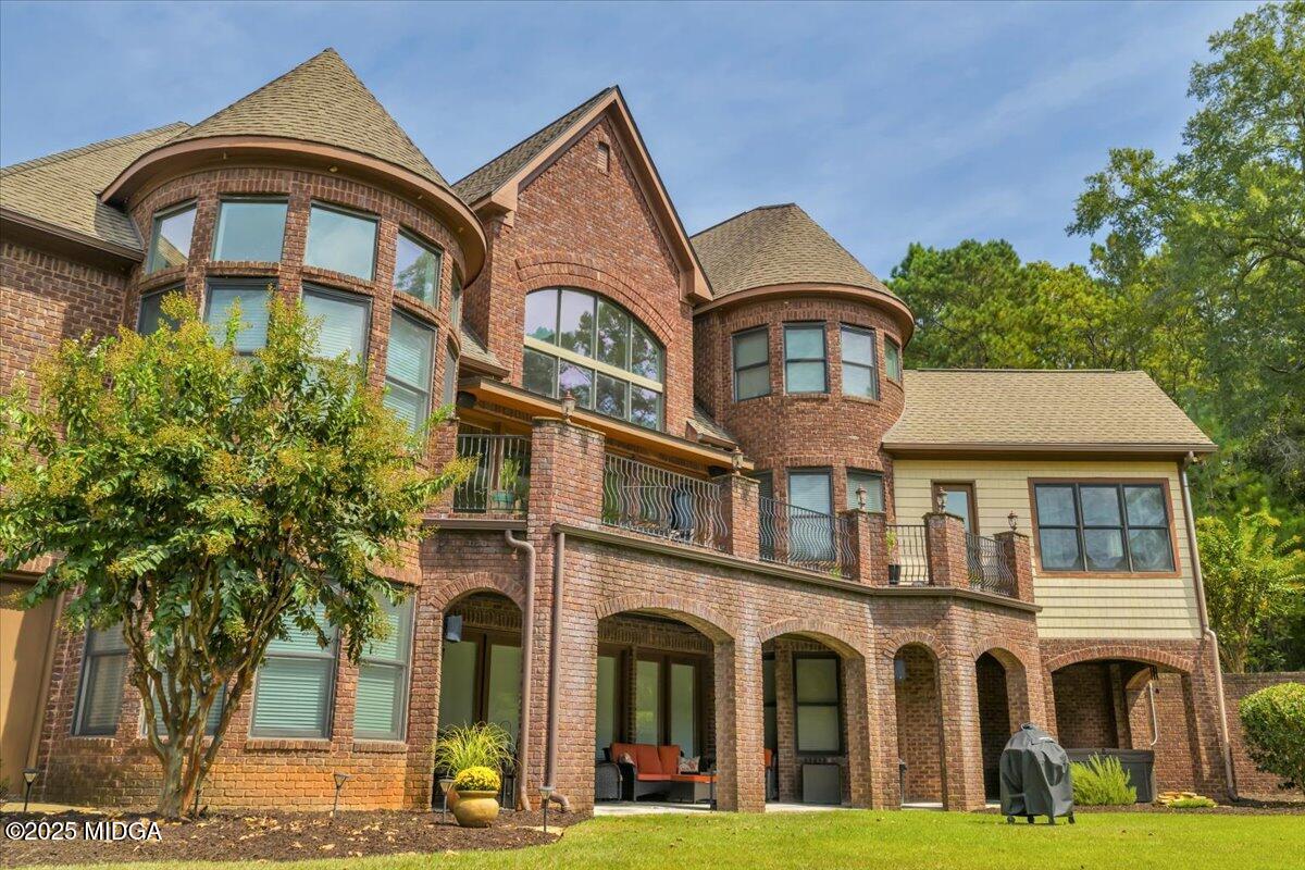 208 Crystal Drive Byron, GA 31008 - Photo 8 of 87 a front view of a residential apartment building with a yard