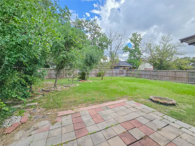 a view of a backyard with a garden