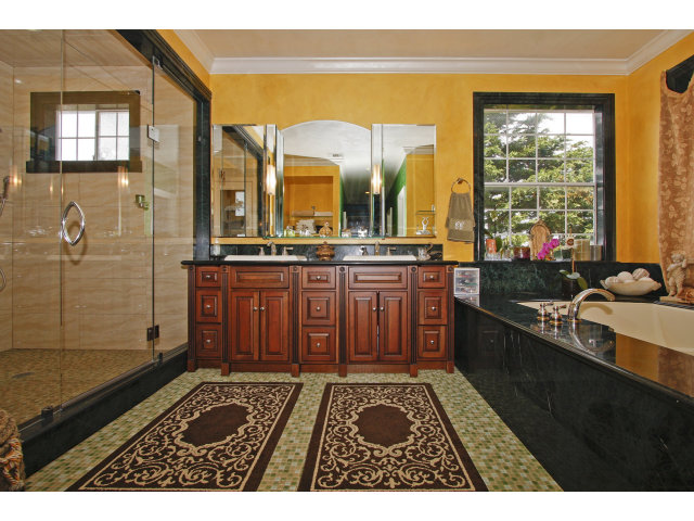 9 Ashdown Place Half Moon Bay, CA 94019 - Photo 14 of 21 a view of a kitchen with kitchen island granite countertop a sink and a stove
