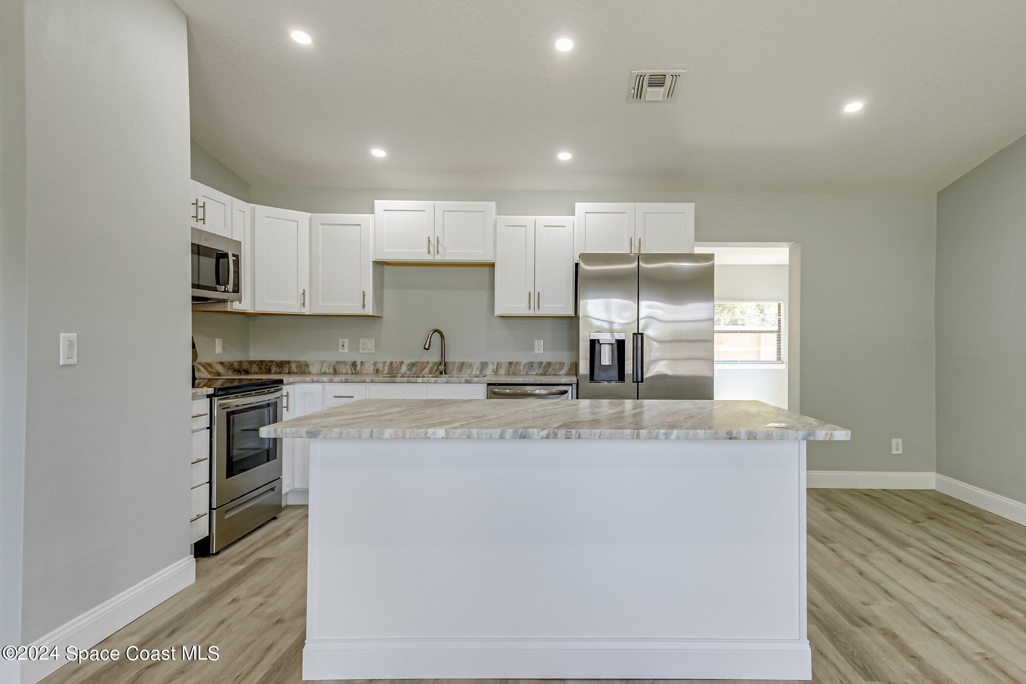 861 Furth Road Northwest Palm Bay, FL 32907 - Photo 5 of 23 561-Furth-207.jpg-SMALL