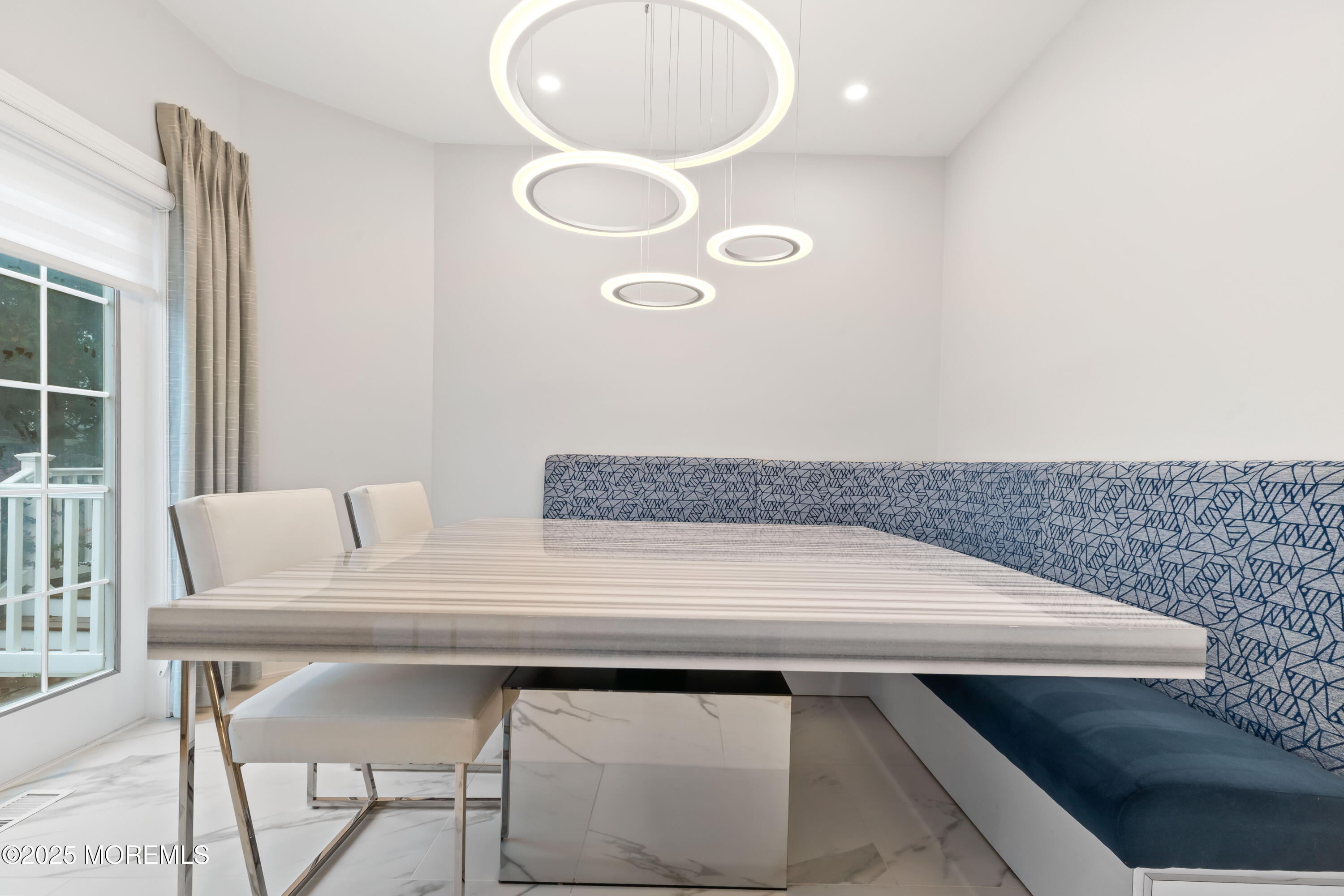 17 Riviera Drive Long Branch, NJ 07740 - Photo 22 of 52 a view of table and chair