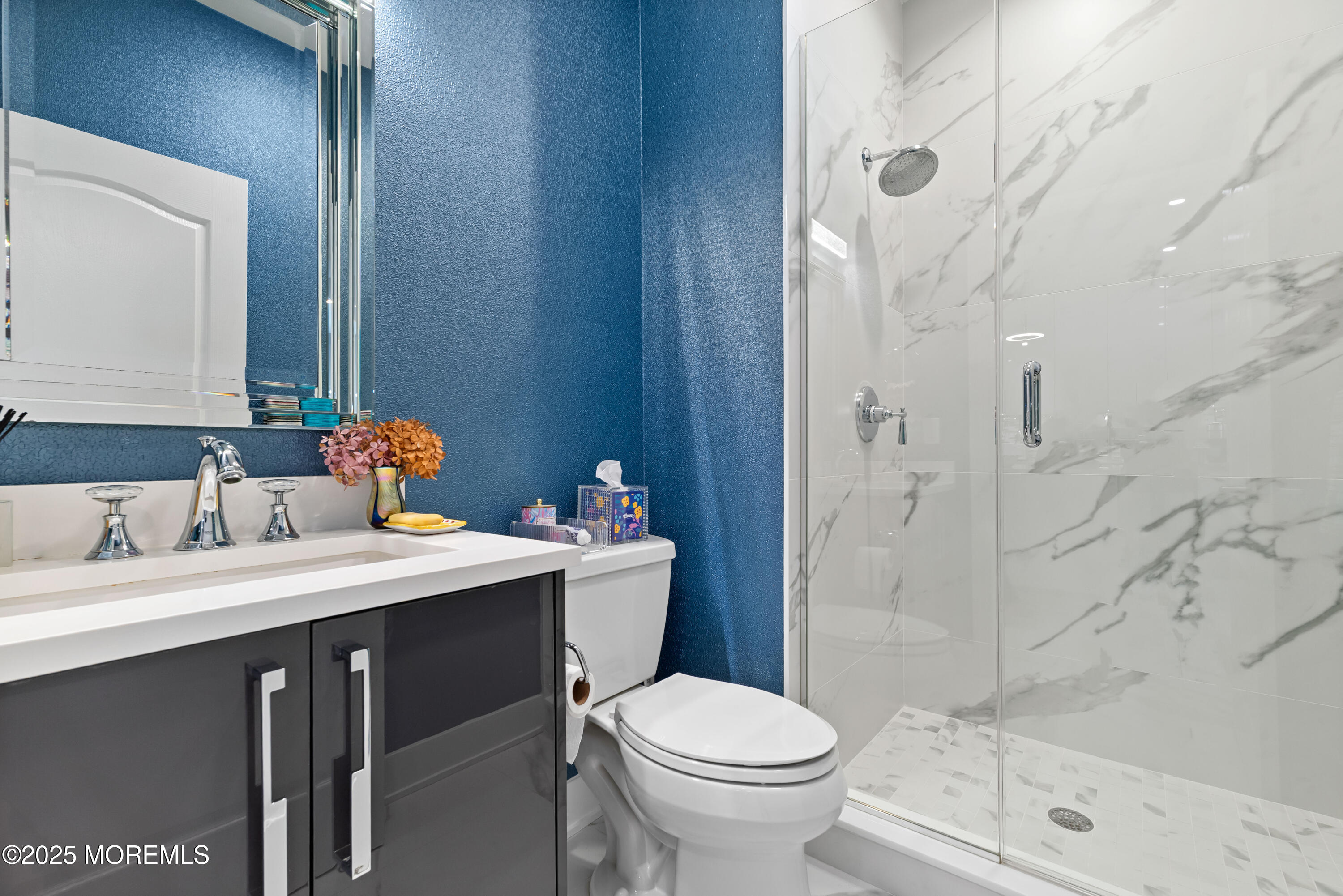 17 Riviera Drive Long Branch, NJ 07740 - Photo 23 of 52 a bathroom with a sink toilet and shower