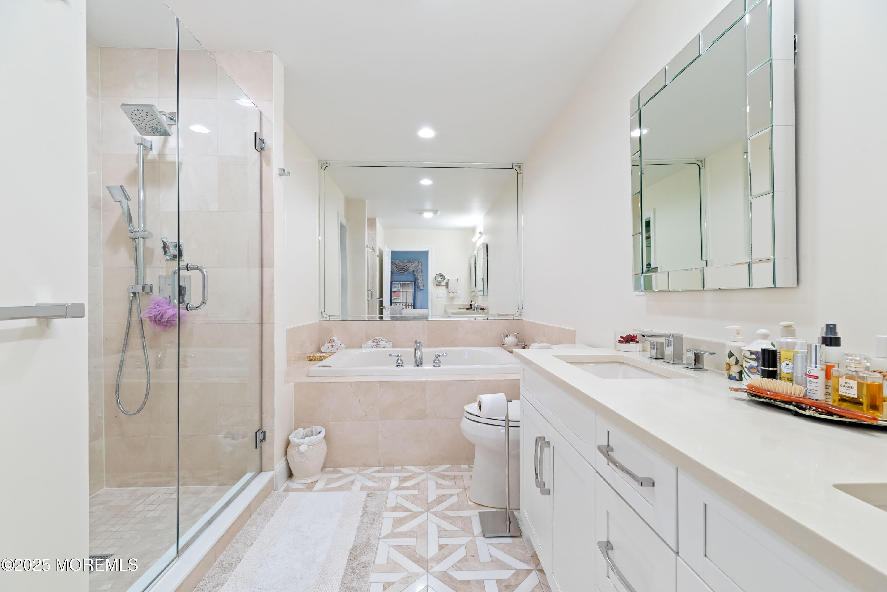 17 Riviera Drive Long Branch, NJ 07740 - Photo 32 of 52 a bathroom with a double vanity sink mirror and shower