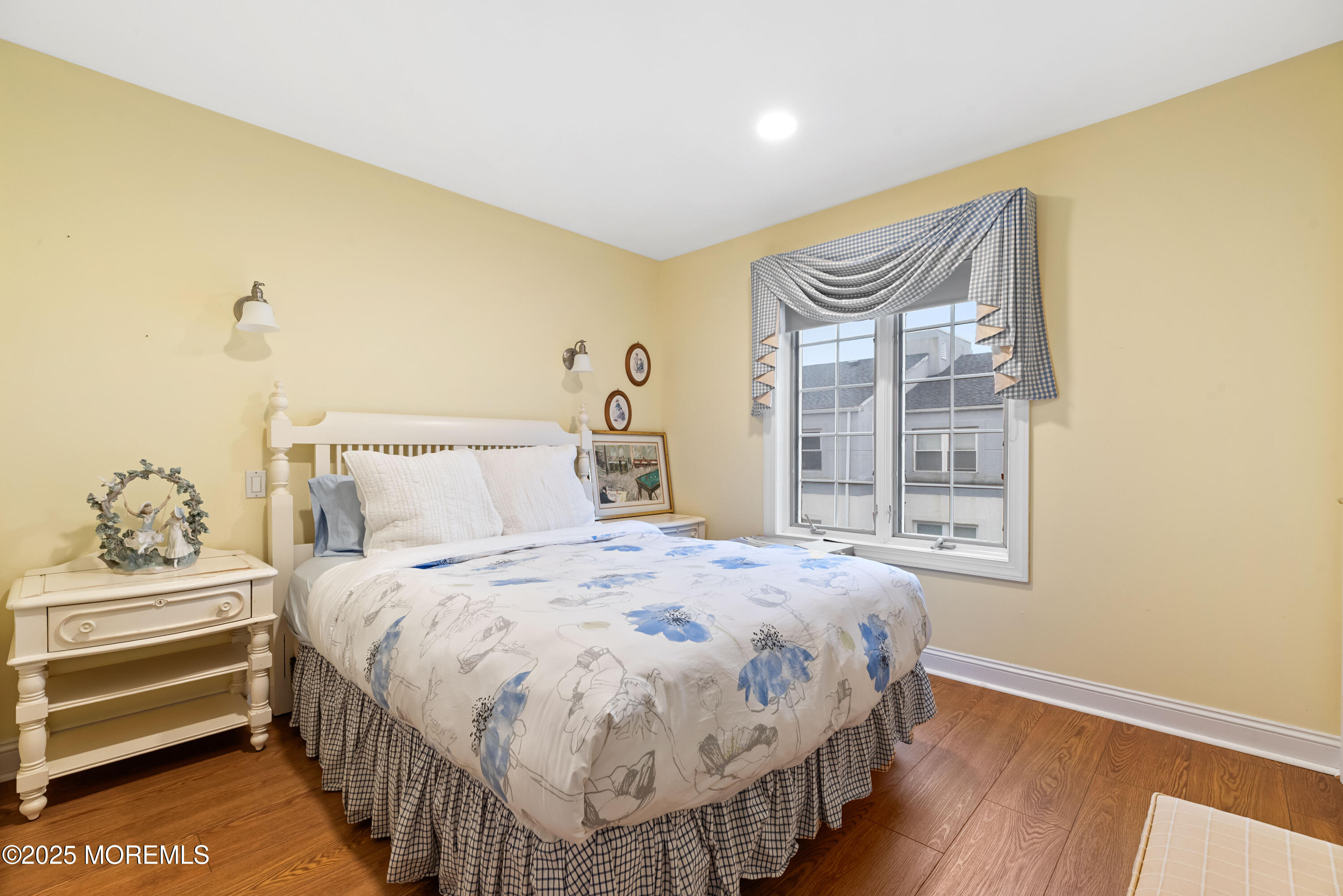 17 Riviera Drive Long Branch, NJ 07740 - Photo 34 of 52 a bedroom with a bed and wooden floor