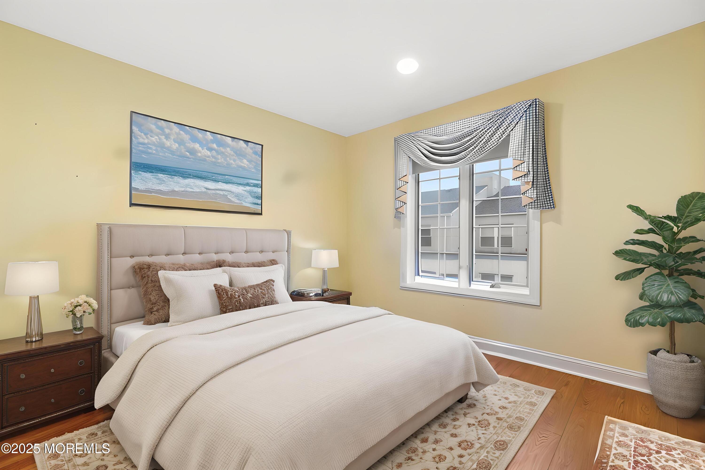 17 Riviera Drive Long Branch, NJ 07740 - Photo 35 of 52 a bedroom with a bed and a window