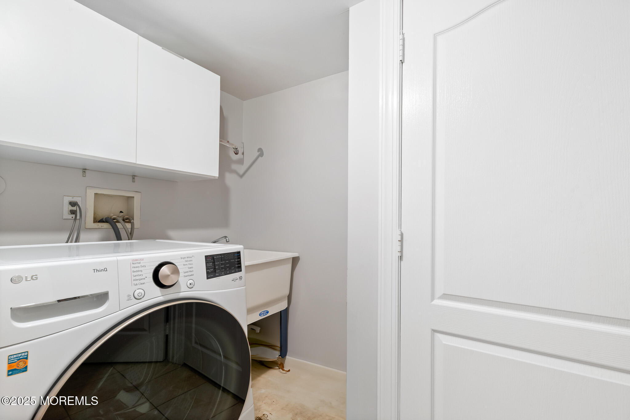 17 Riviera Drive Long Branch, NJ 07740 - Photo 39 of 52 a utility room with dryer and washer