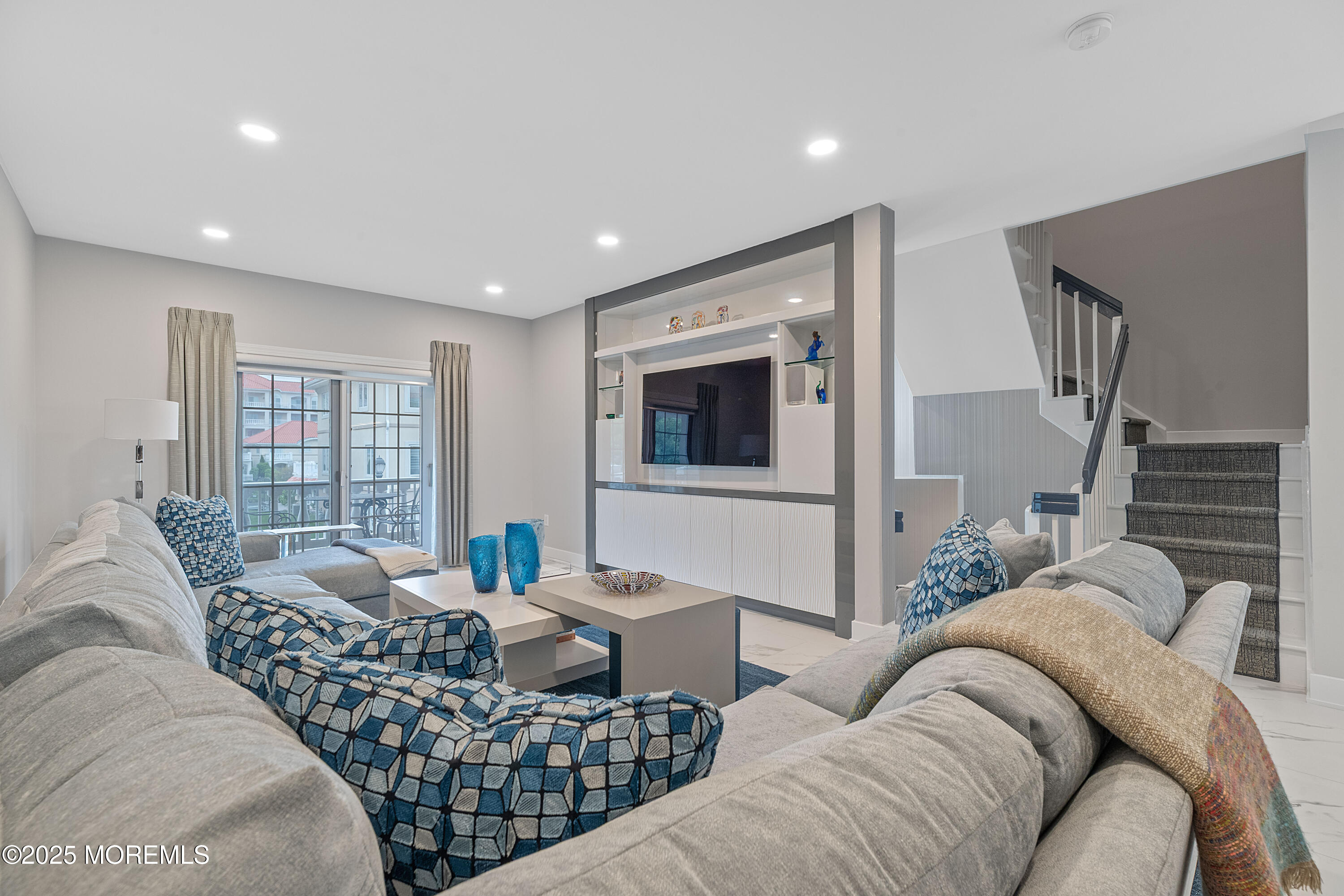 17 Riviera Drive Long Branch, NJ 07740 - Photo 7 of 52 a living room with furniture and a large window
