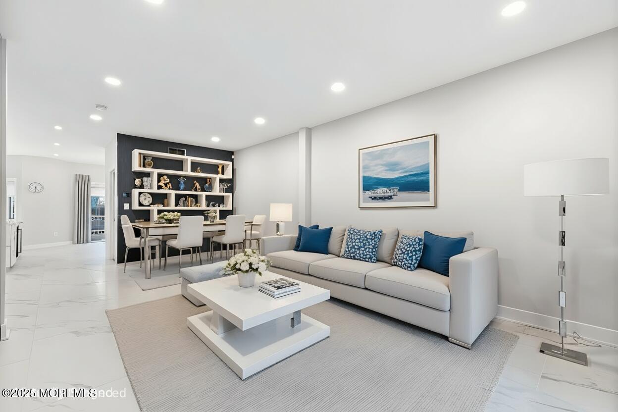 17 Riviera Drive Long Branch, NJ 07740 - Photo 8 of 52 a living room with furniture and view of kitchen