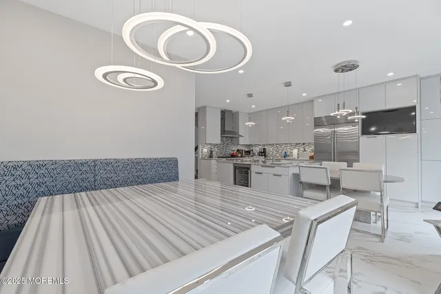 a kitchen with refrigerator cabinets and a counter top space
