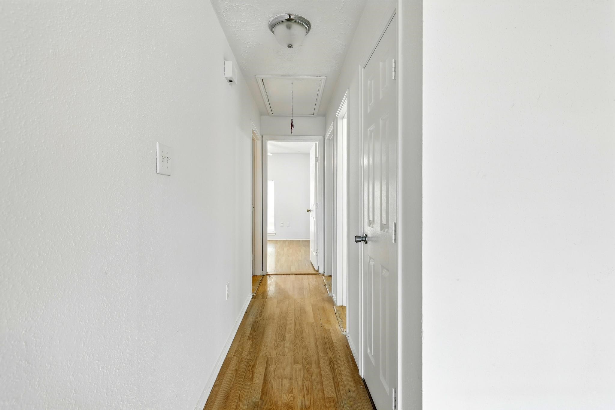 24011 Lone Elm Drive Spring, TX 77373 - Photo 14 of 37 Hallway from LR to Secondary Bedrooms